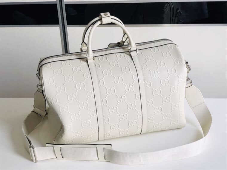 Gucci GG Embossed Duffle Bag - White
