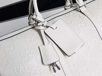 Gucci GG Embossed Duffle Bag - White