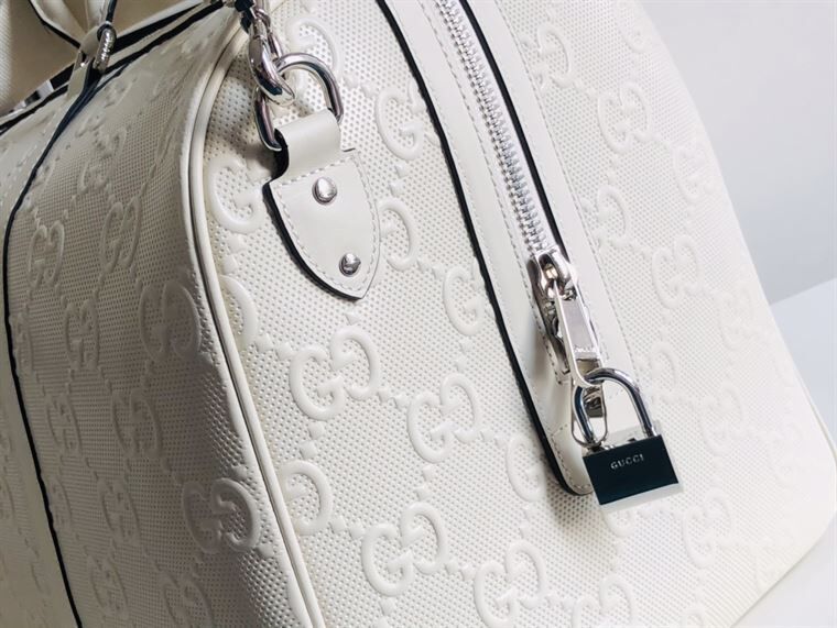 Gucci GG Embossed Duffle Bag - White