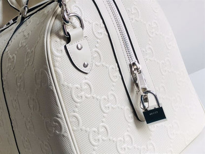 Gucci GG Embossed Duffle Bag - White