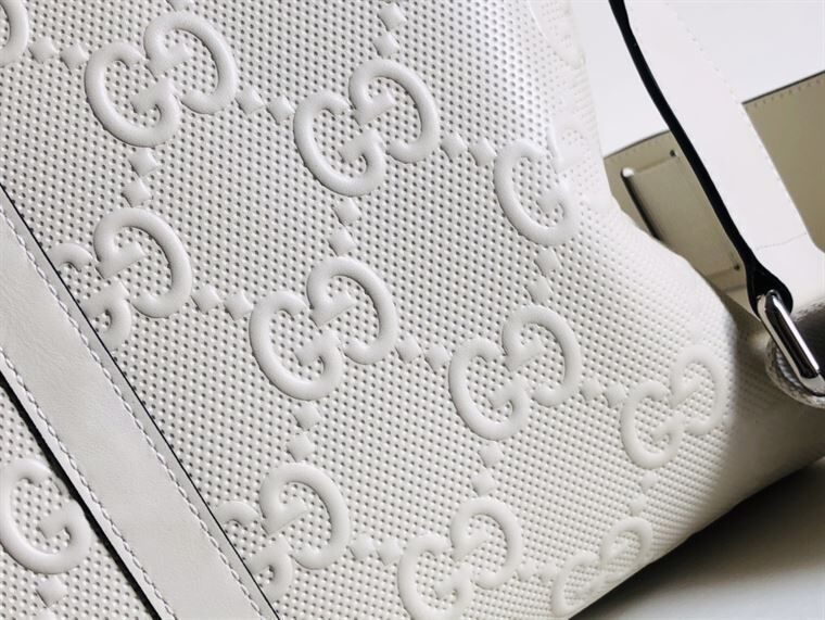 Gucci GG Embossed Duffle Bag - White