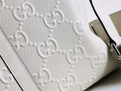 Gucci GG Embossed Duffle Bag - White