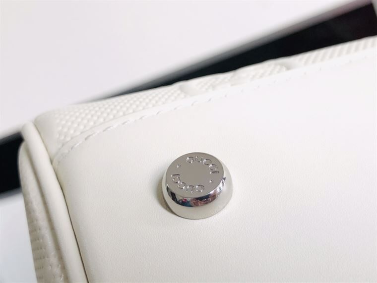 Gucci GG Embossed Duffle Bag - White