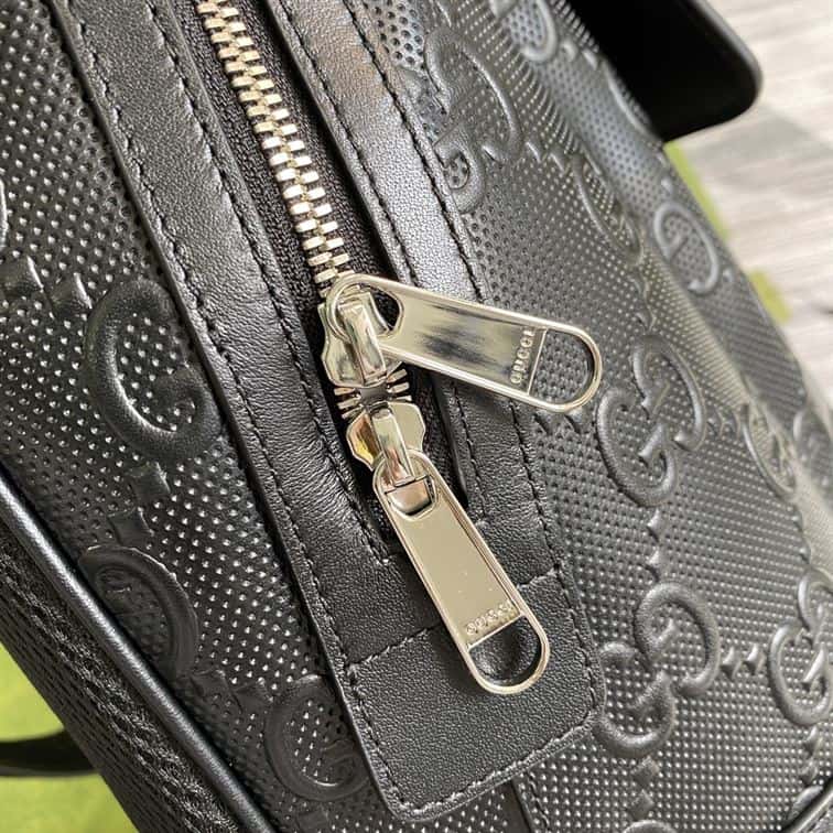 Gucci Logo Embossed Leather Backpack - Black