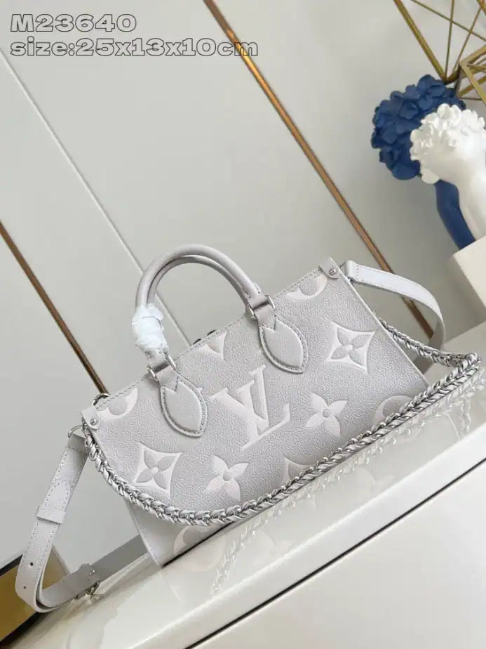 LV On The Go East West Bag - Grey
