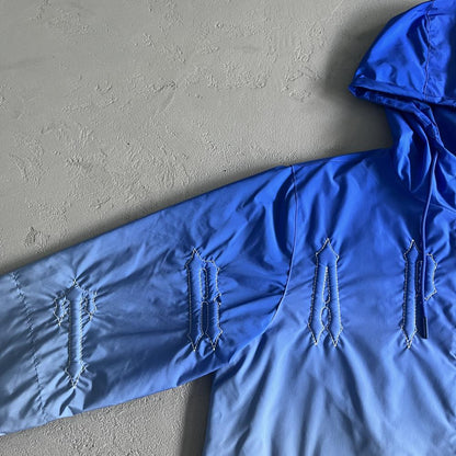 TS Outline Arch Windbreaker - Sky Blue