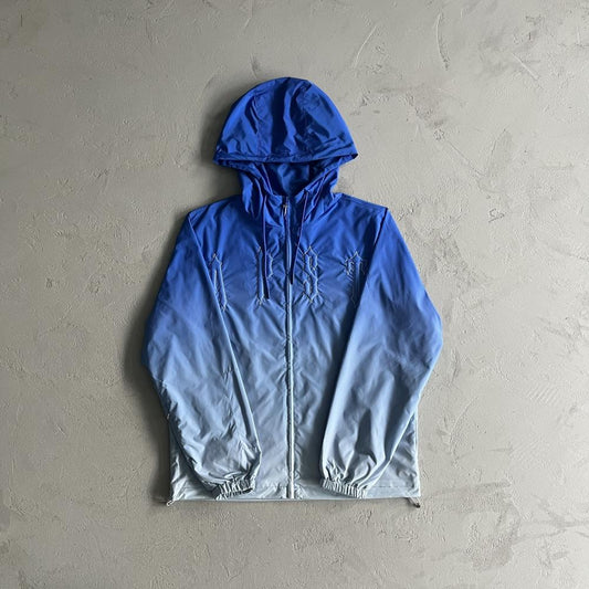 TS Outline Arch Windbreaker - Sky Blue
