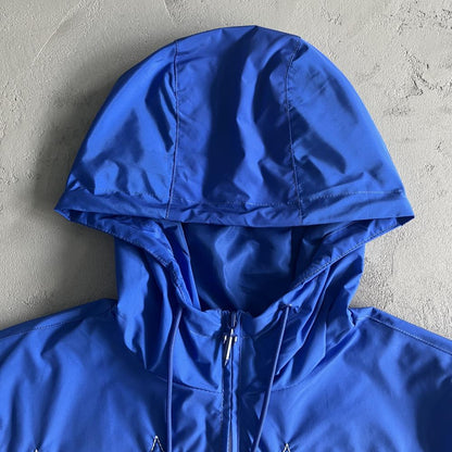 TS Outline Arch Windbreaker - Sky Blue